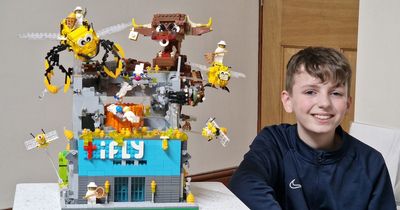 Boy, 13, is crowned country's best Lego builder with model of skydive centre under attack