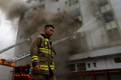 Thousands evacuated as fire hits warehouse in crowded Hong Kong district
