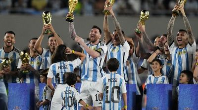 Messi Mania Grips Argentina in 1st Match as World Cup Champs