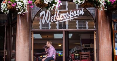 Wetherspoon pub chain sees profits down 90%