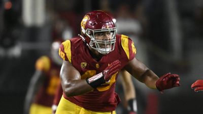 USC’s Tuli Tuipulotu: ‘It would be a blessing’ to play in LA with Aaron Donald