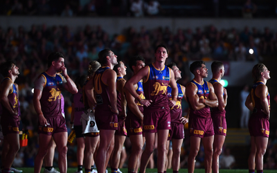 Lights go out at the Gabba in one of AFL’s most bizarre nights ever