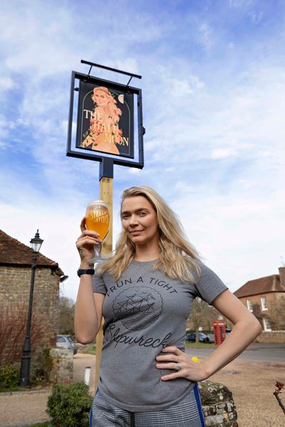 Model-turned-publican gives regulars a shock by posing in the buff for new pub sign
