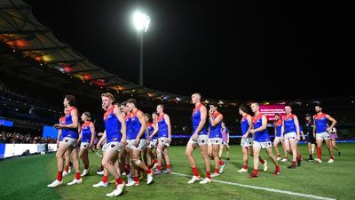 Gabba blackout during Lions-Demons AFL clash casts eyes forward to stadium upgrade for 2032 Brisbane Olympic Games