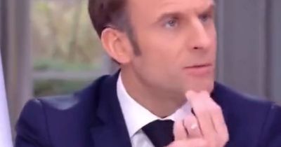 Emmanuel Macron awkwardly slips off expensive watch in middle of interview about pensions