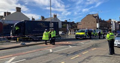 Football fans and off-duty nurses rush to help those injured in lorry crash