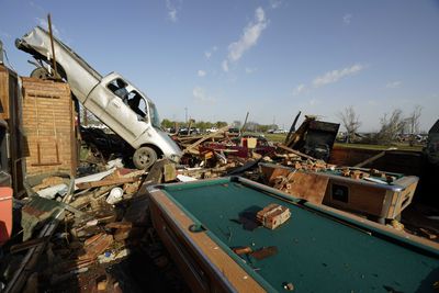 Photos show the devastation caused by the deadly Mississippi tornado