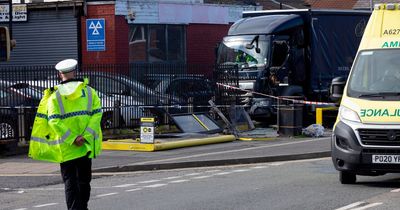 Woman at bus stop among four injured in horror lorry crash