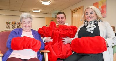 East Belfast youth donate hand-sewn gifts to local pensioners
