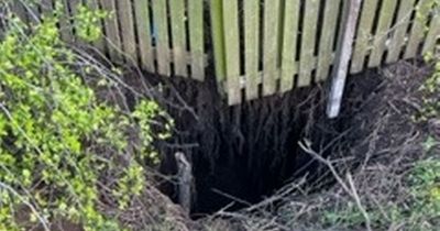 Concern as giant sinkhole appears in Scots residential street
