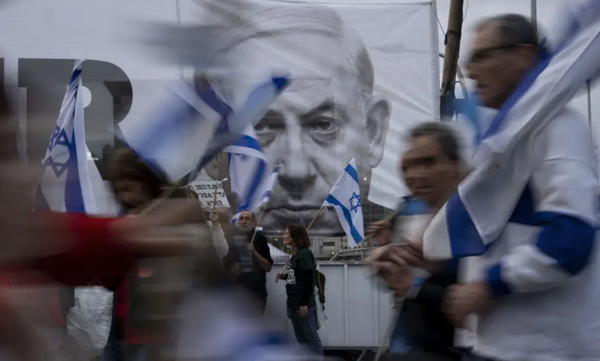 Israeli Defense minister calls for halt to judicial overhaul