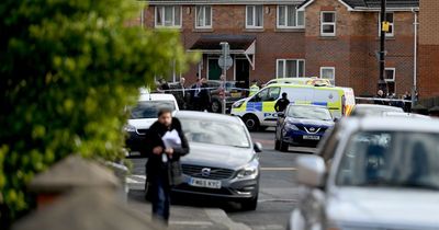 Horror as man 'shot dead in targeted attack' as children played nearby