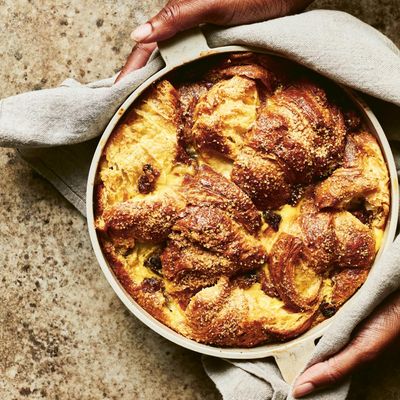 Spiced bread and butter pudding with saffron and dates recipe by Benjamina Ebuehi