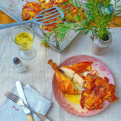 Recipe for punched potatoes and a roast chicken by Olia Hercules