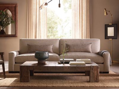 'It's minimalist, but still comfy!' 4 tips for having throw pillows on a couch while keeping the room calm and uncluttered