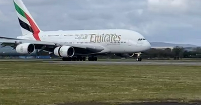 Footage shows moment the world's largest airliner touches down in Glasgow for first time since 2019