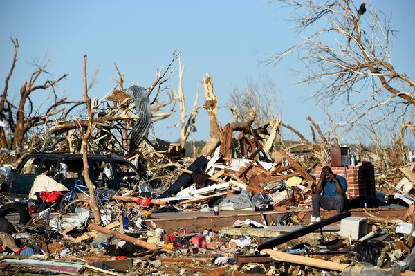 Mississippi and Alabama face a painful recovery after storms and a tornado killed 26