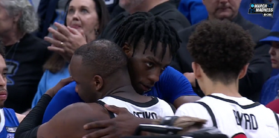 Brothers Adam Seiko and Arthur Kaluma shared a sweet hug after San Diego State topped Creighton in the Elite Eight