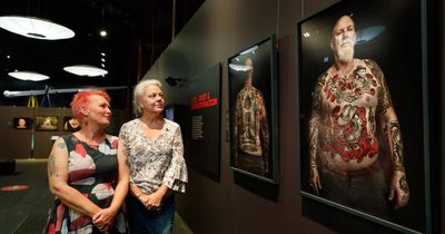 Exhibition tells veterans' stories through their tattoos