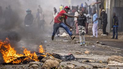Kenya police fire tear gas as anti-government demonstrators take to the streets