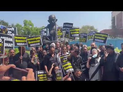 Opposition MPs march towards Vijay Chowk in black attire in a bid to show unity against Centre