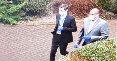 Men in rubber gloves and masks hunted by cops over attempted fraud in Scots village