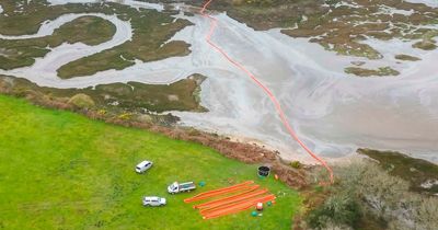 Poole oil spill: Aerial pictures show scale of devastation as black mass fills river
