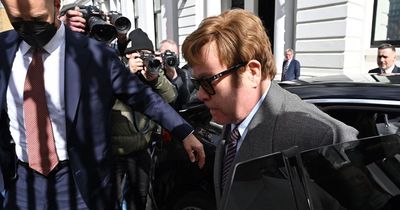 Sir Elton John makes low-key court appearance as he arrives in the UK alongside Prince Harry