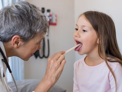 What are the symptoms of tonsillitis and how is it treated?
