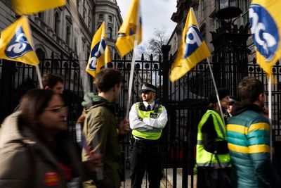 More than 130,000 civil servants to strike next month in pay row