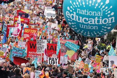 Education unions consider pay offer but NEU recommends members reject it