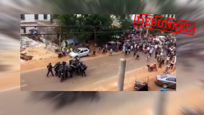 Where was this video filmed of a mob chasing down police?