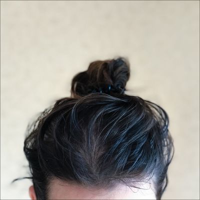 Why Your Hair Still Feels Greasy After You Wash It, According to a Hairstylist