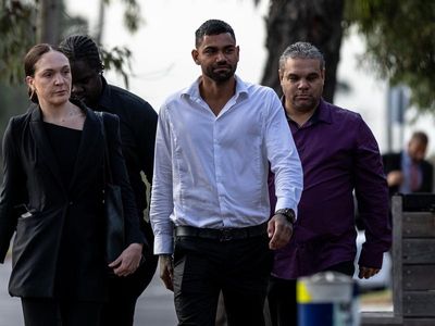 Kangaroos player Tarryn Thomas to fight threat charge