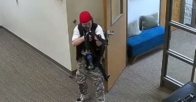 Chilling CCTV shows Nashville school shooter storm building armed with assault rifles