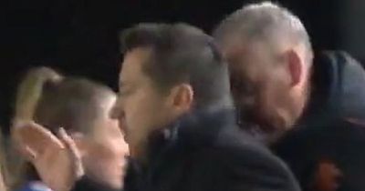 Rangers coach appears to aim HEADBUTT at Celtic manager and brands rival a 'rat' in Old Firm clash