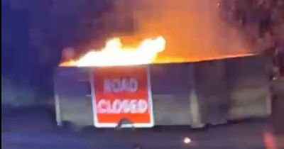 Road block planters set alight hours after scheme to encourage public transport launches