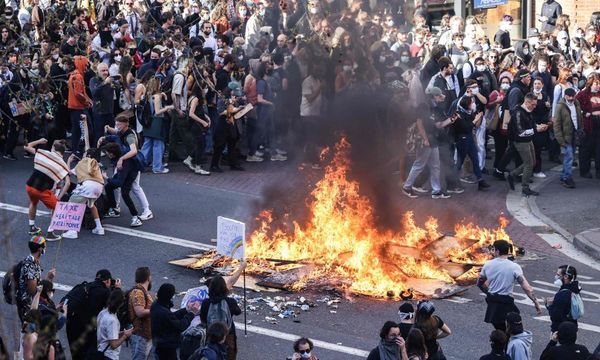 French protesters and police clash in marches against pension changes