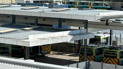 Ambulances ramped in Flinders Medical Centre car park, as emergency department hits capacity twice in past week