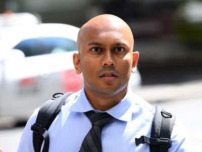 Judge refuses to delay rape-accused cop's trial