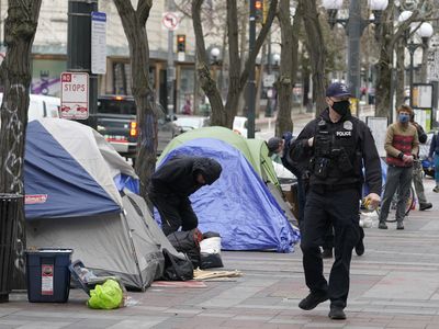 Seattle and Justice officials seek to end most oversight of city's police