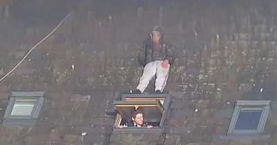 Man caught in cannabis farm tried to hide from police by standing above skylight on house roof