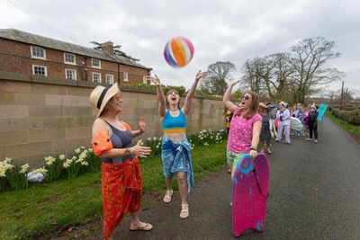 Activists in swimwear queue outside Rishi Sunak's heated pool