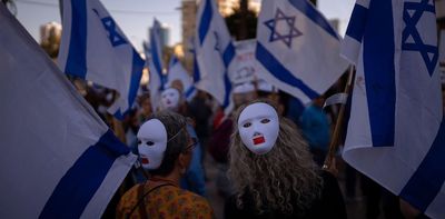 Israel protests: Netanyahu delays judicial reforms over fears of 'civil war' – but deep fault-lines threaten future of democracy