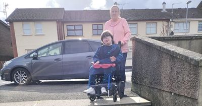 Mum’s call for help as disabled son has to climb steps on his hands and knees to get to school bus