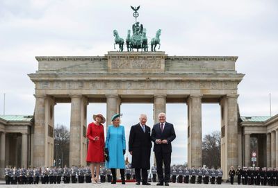 Pomp and paper crowns as Germany welcomes Charles III