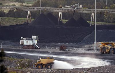 Australian parliament approves emissions caps on big polluters