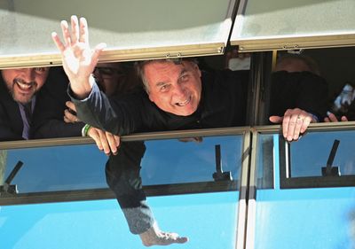 Bolsonaro lands back in Brazil to lead right-wing opposition