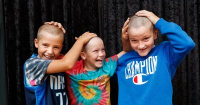 'More than a gold coin donation': Trio shave heads for cancer charity