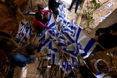 'Fighting for our country': Israeli protest group make more than half a million flags